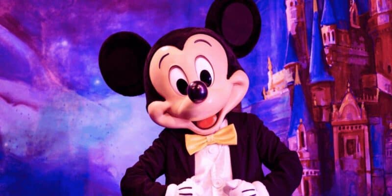 Cast Member dressed as Mickey Mouse at a Disney Park