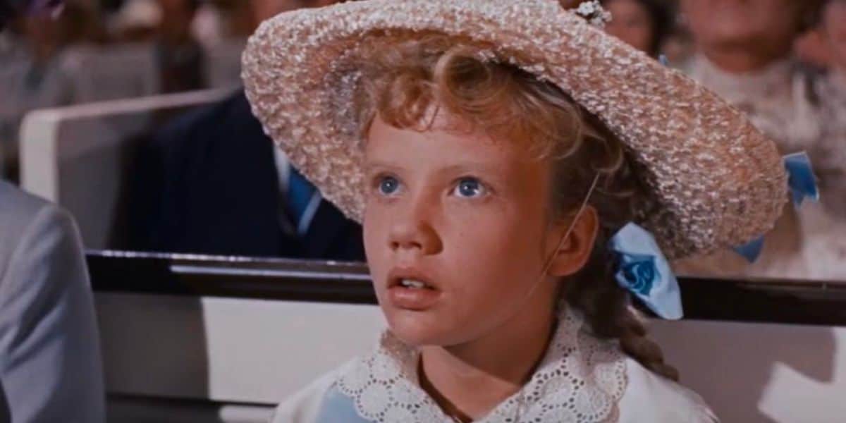 Pollyanna sits in church