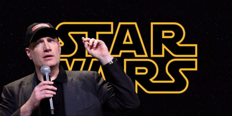 Marvel chief Kevin Feige in front of the Star Wars logo, talking on a microphone