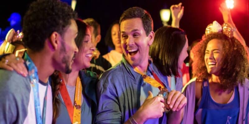 Guests happy after finishing a marathon at runDisney