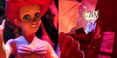 Guest pulls out item on Little Mermaid ride at Magic Kingdom