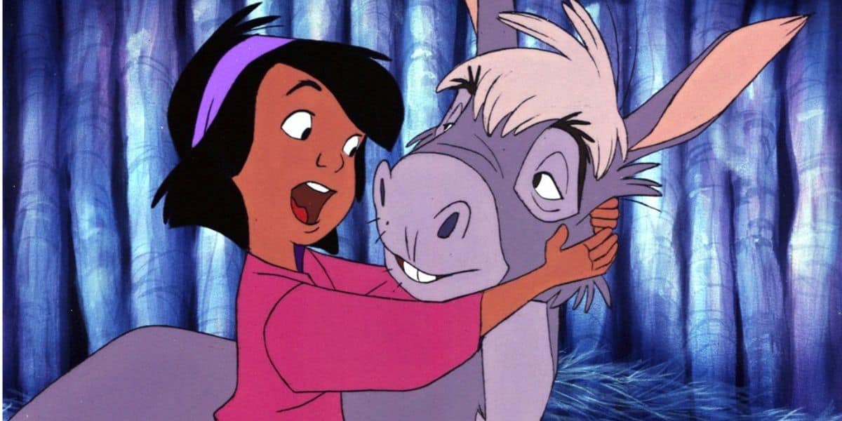 The boy and his donkey in Small One