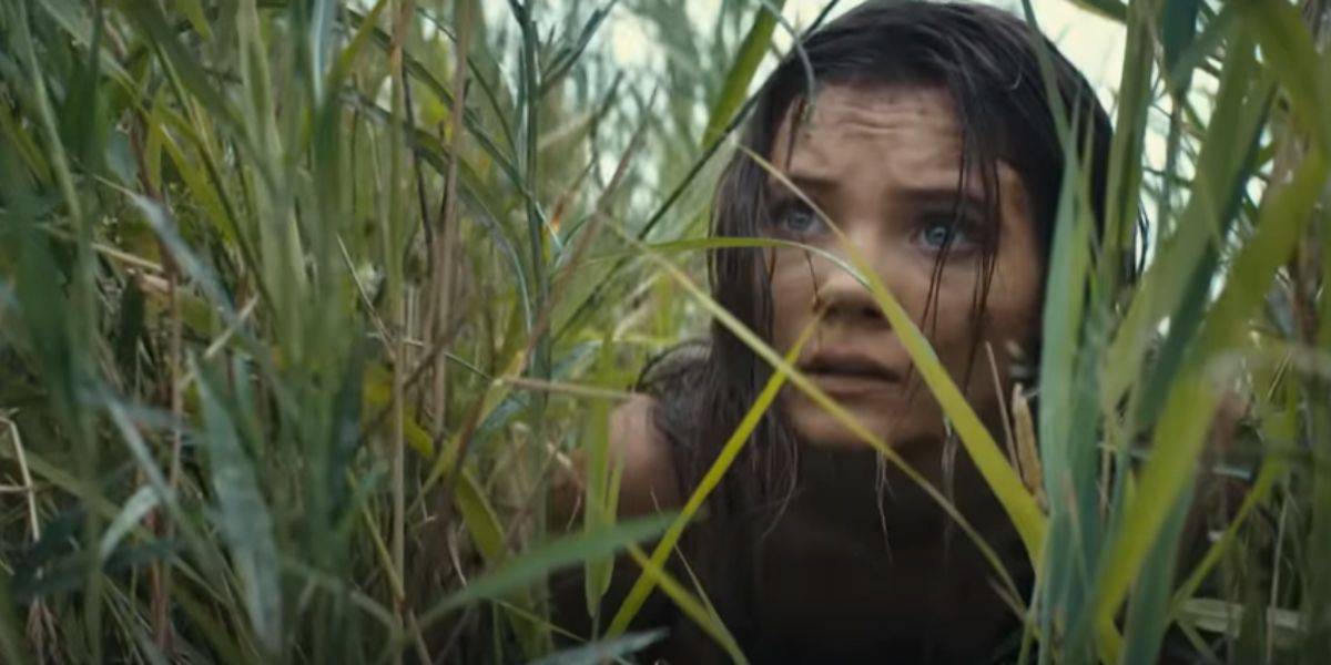 Mae (Freya Allen) in the grass in the 'Kingdom of the Planet of the Apes' trailer