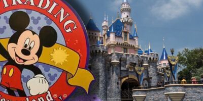 The official Disneyland pin trading logo with the Sleeping Beauty Castle in the background of Disneyland Resort.