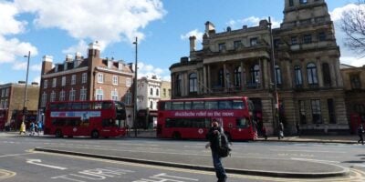 Two red buses in London
