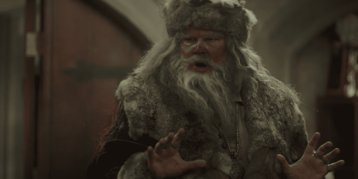 Erik Stonestreet as 'The Mad Santa,' looking disheveled. 
