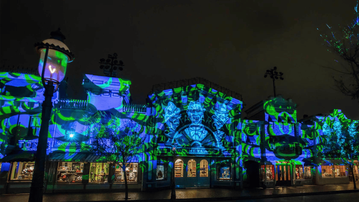 Main Street, U.S.A, with projections from the Haunted Mansion during Mickey's Mix Magic at Disneyland Park