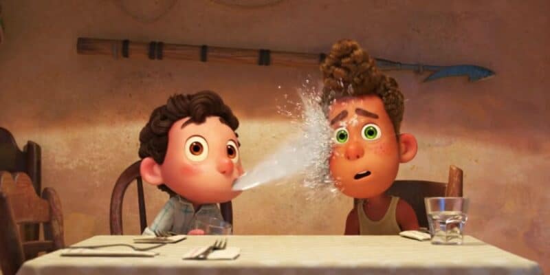 Luca spitting water in Alberto's face