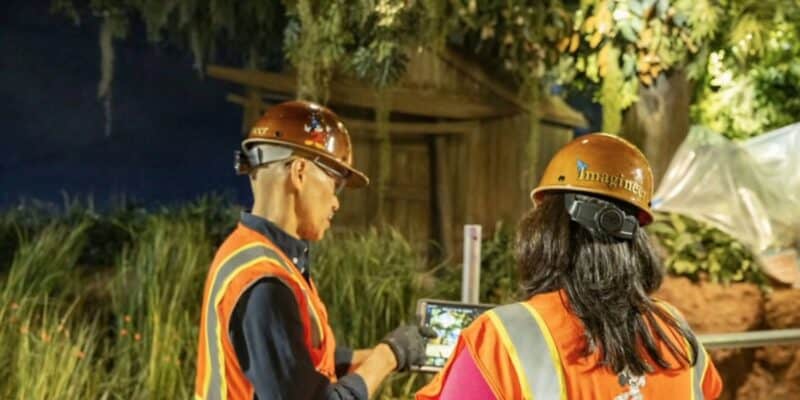 A photo of Imagineers working behind the scenes on Tiana's Bayou Adventure