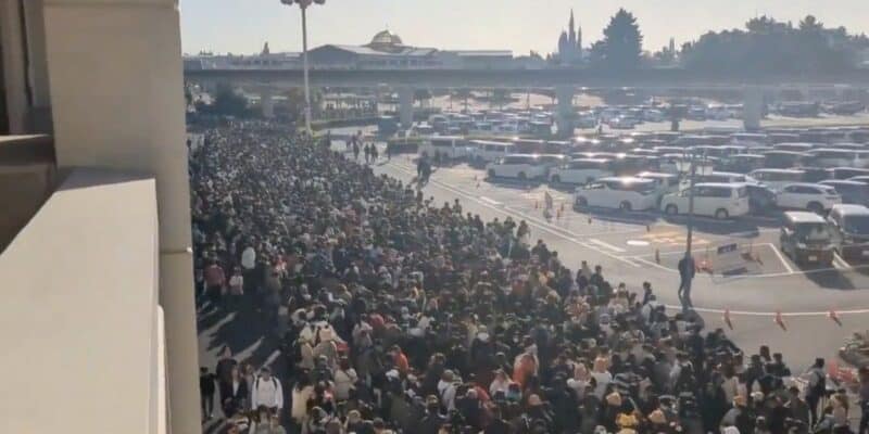 Thousands of guests line up at Tokyo Disneyland entrance, as guests prepare for this Disney Resort summer 2025 experiences.