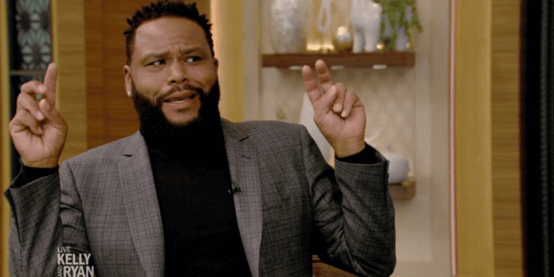 Anthon Anderson making finger quotes with his hands during an interview.