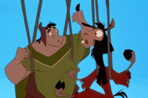 Kuzco and Pacha looking surprised while hanging from vines in 'The Emperor's New Groove' (2000), representing surprise after hearing that the musical inspired by the movie is not being developed by Disney