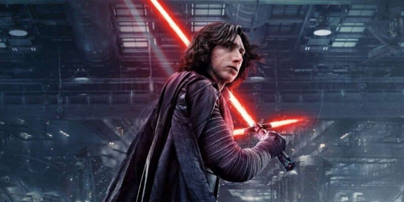 Adam Driver as Kylo Ren wielding his signature double-hilted red lightsaber in the 'Star Wars' Sequel Trilogy.