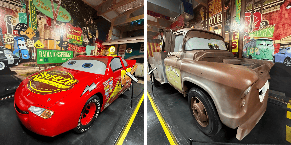 Lightning McQueen and Tow Mater life size cars on display.