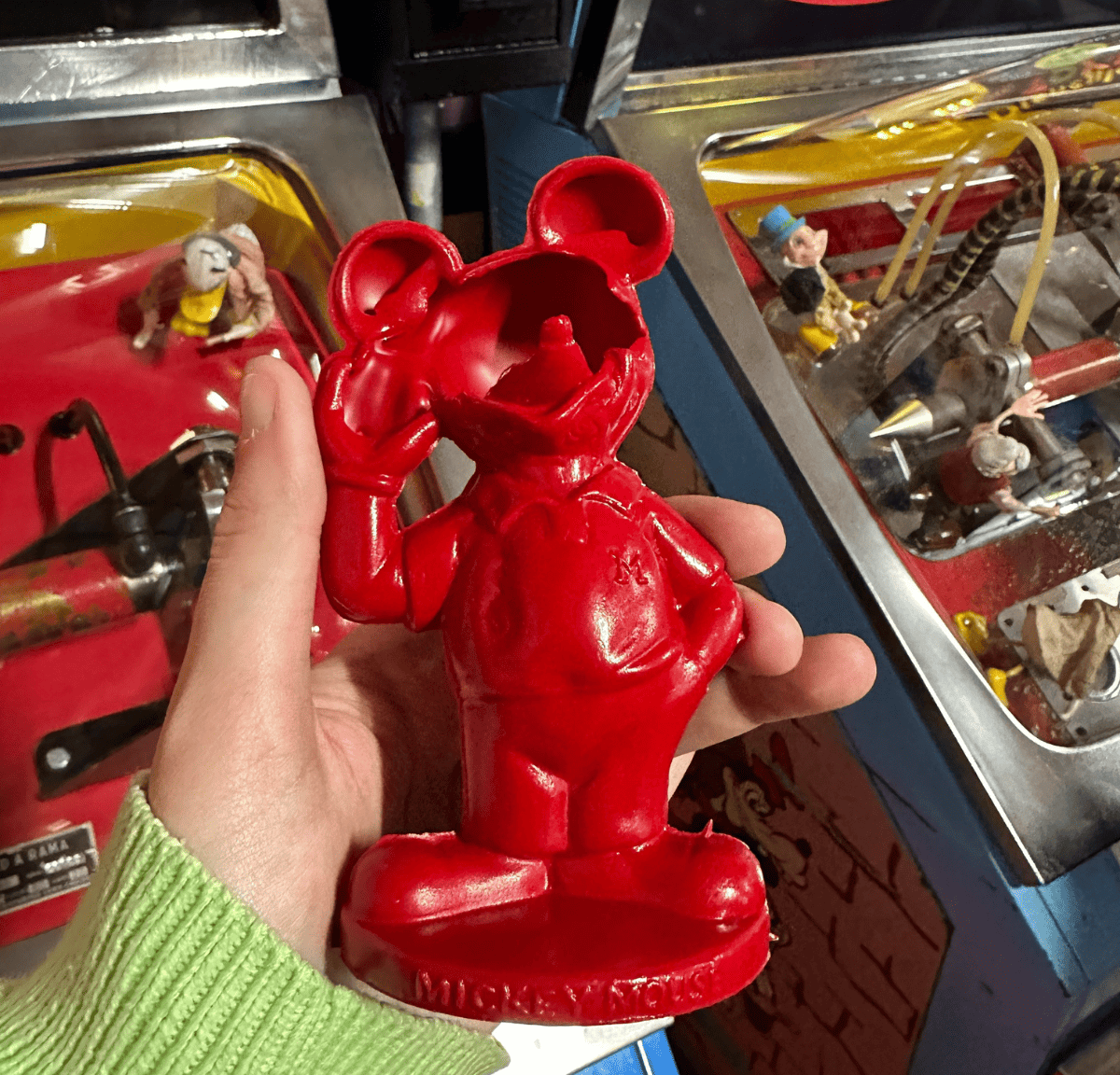 A Mickey Mouse mold-a-rama with its face melted off.