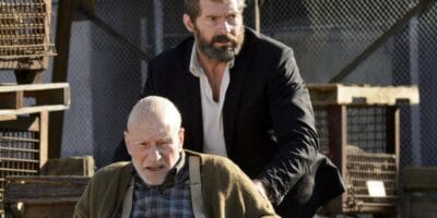 Logan/Wolverine pushing Professor X in a wheelchair