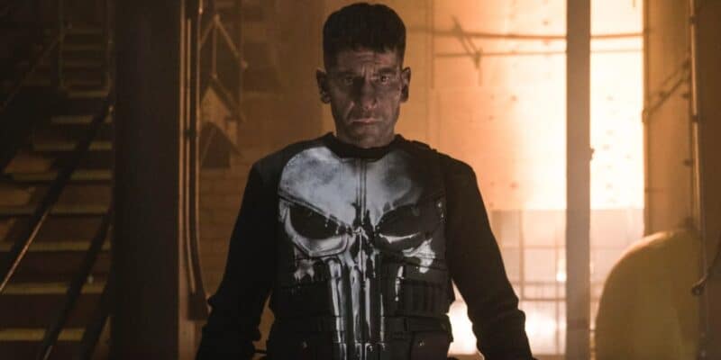 Jon Bernthal as The Punisher in a orange-lit warehouse