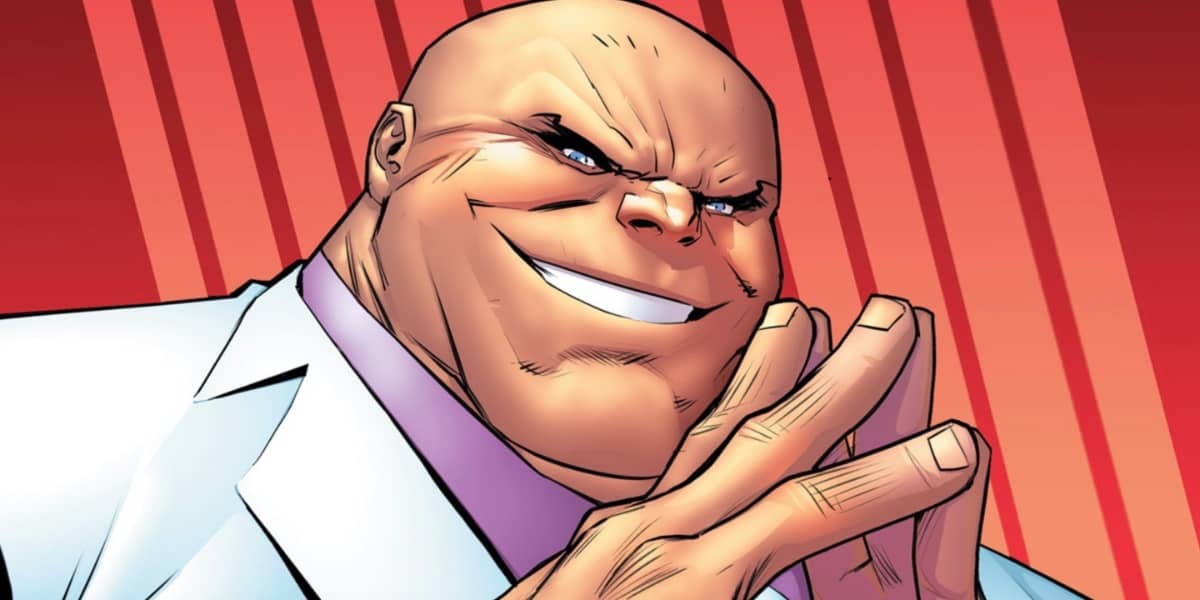 Kingpin grinning menacingly and touching his fingertips together