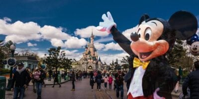 Mickey Mouse waving in Disneyland Paris park
