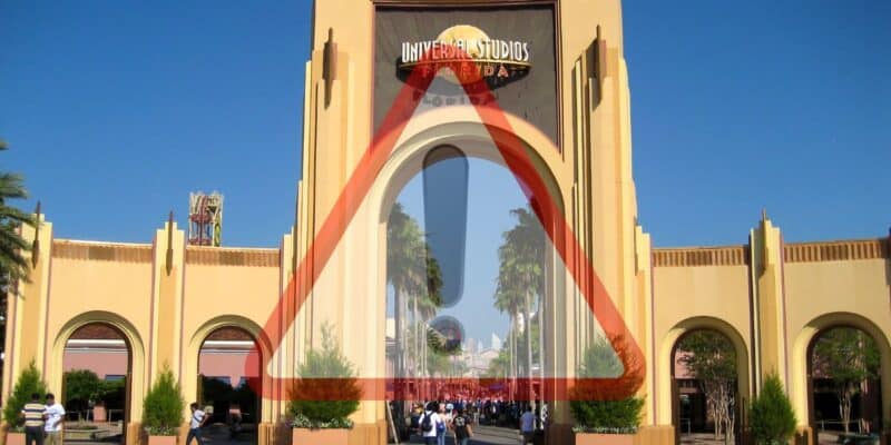 Entrance to universal studios Florida with alert overlay