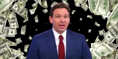 Ron DeSantis superimposed over cascading 100 dollar bills