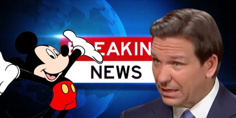 Mickey Mouse and DeSantis over a news chyron