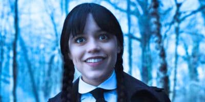 Jenna Ortega smiling as Wednesday Addams