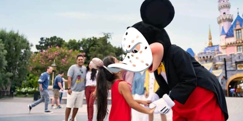 Mickey Mouse wearing Anaheim Ducks mask