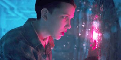 Millie Bobby Brown as Eleven in Stranger Things breaking through to the Upside Down