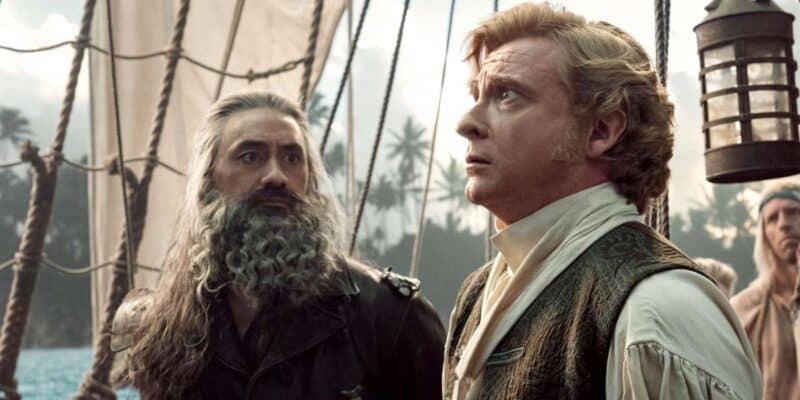 Taika Waititi as Blackbeard/Edward "Ed" Teach (left) looking at Rhys Darby in profile as Stede Bonnet (right) in Our Flag Means Death