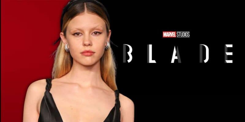 Mia Goth poses in front of the logo for Marvel Studios' 'Blade'