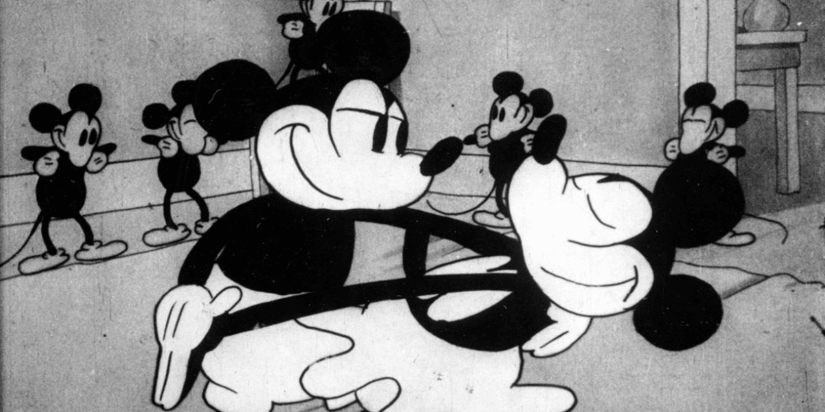 Minnie Mouse and Mickey Mouse dancing in 'When The Cat's Away.' 