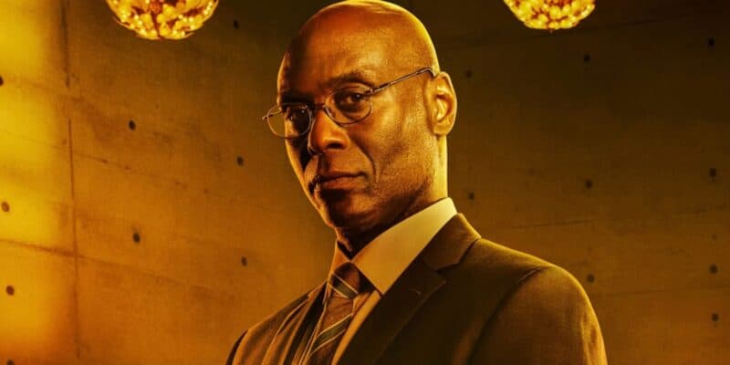 Lance Reddick looking seriously in a golden light