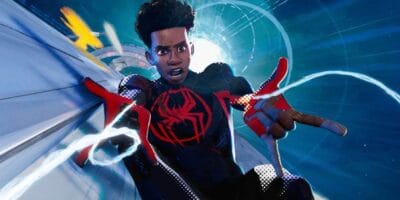 Miles Morales/Spider-Man shooting webs as he flies down a building