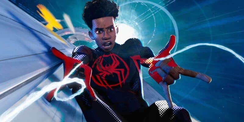 Miles Morales/Spider-Man shooting webs as he flies down a building