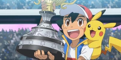 Ash and Pikachu looking happy while holding a trophy