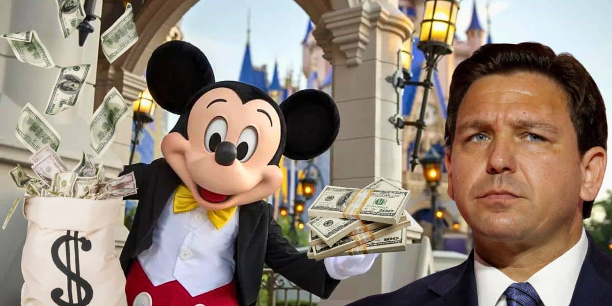 Money falling next to Mickey Mouse with Ron DeSantis looking sad inside of Disney World.