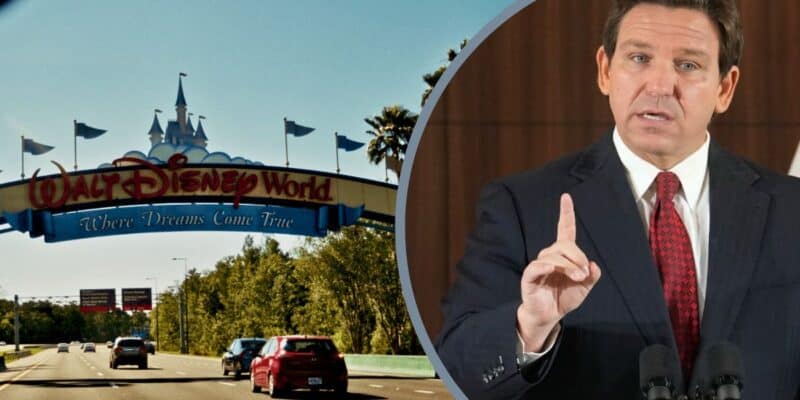Florida State law Disney - Ron DeSantis standing on a podium next to the Disney World entrance.