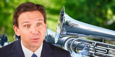 Ron DeSantis with a brass band playing next to him