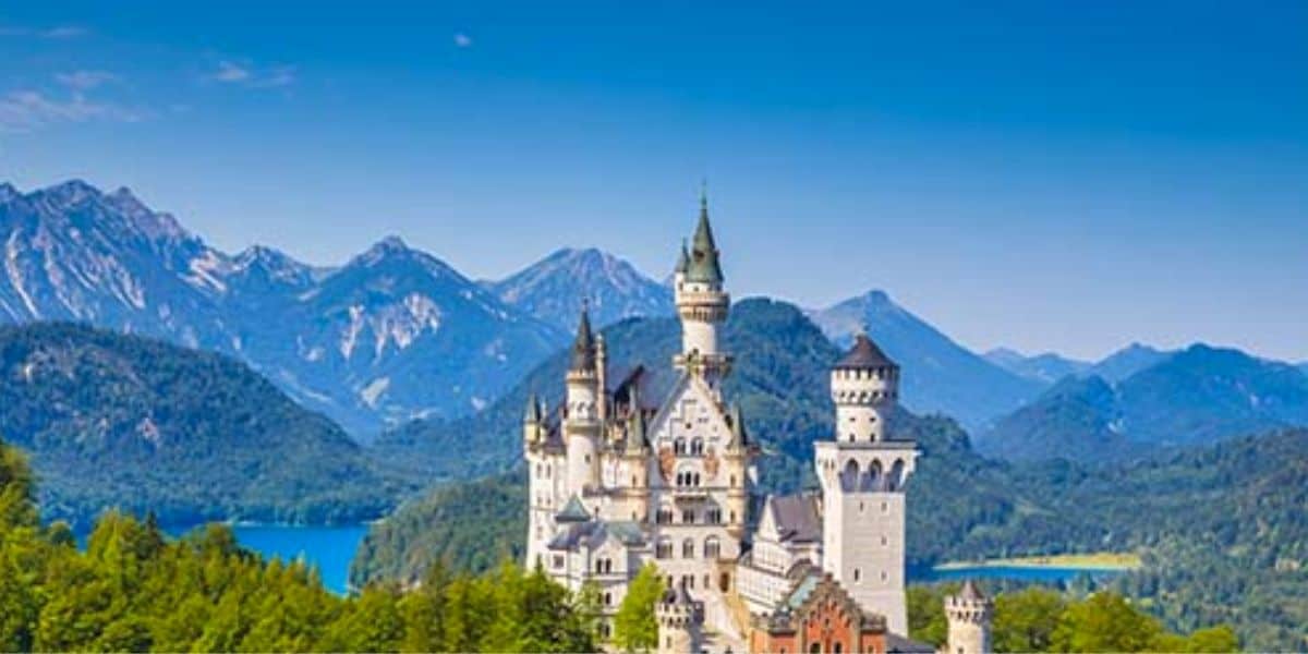 Neuschwanstein Castle as seen from miles away. This historic building inspired Disney when designing Cinderella Castle.