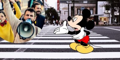Mickey Mouse with a circle of protestors