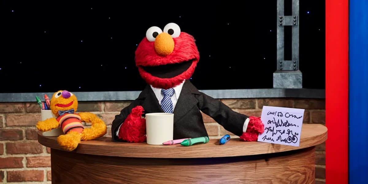 Elmo at his desk