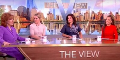 'The View' hosts sit at the talk show table.
