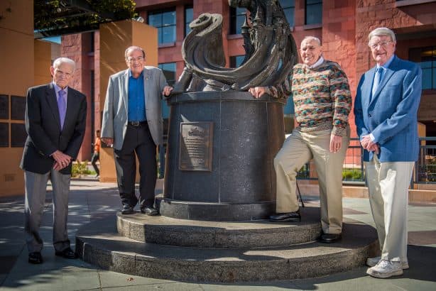 Walt Disney Imagineers and legends posing for a photo, including Carl Bongirno. 