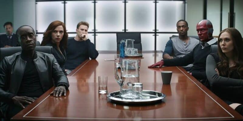 The Avengers looking bored/upset in a boardroom