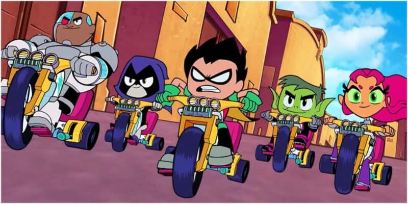 The Teen Titans riding power wheels together