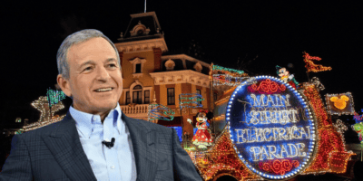 Bob Iger in front of the Main Street Electrical Parade
