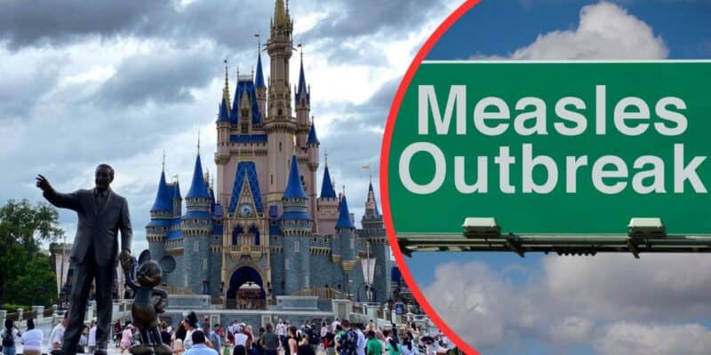 Disney World measles Orlando - A measles outbreak sign in front of the Magic Kingdom castle.