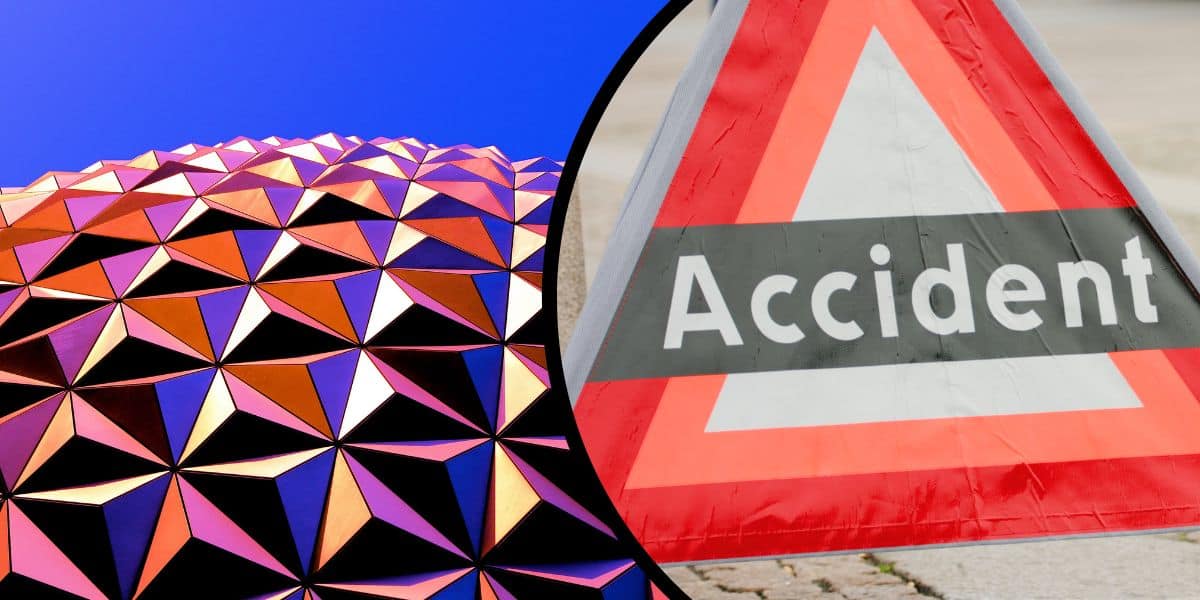 An accident sign in front of the Spaceship EPCOT ball at Disney World next to Test Track.
