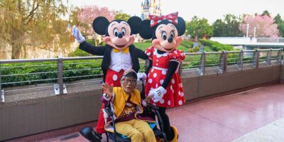 Magnolia Jackson, with Mickey and Minnie Mouse at Walt Disney World.